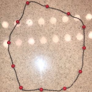 Long red bead necklace